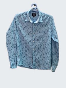 An INDIAN TERRIAN SHIRT BOYS