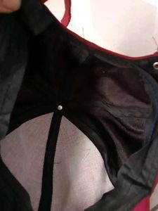 Red Baseball Cap with Unique Clip Detail