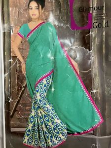 Designer Green Saree with Geometric Border