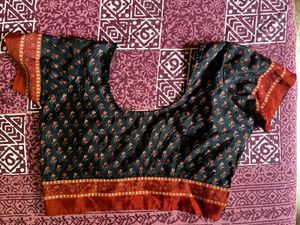 Elegant Black Saree with Orange Border