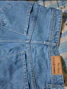 Ripped Blue Denim Jeans