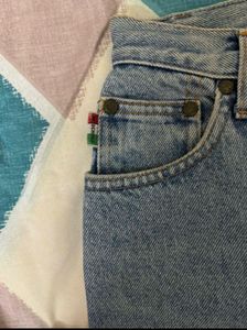 MOSCHINO Light Wash Mom Jeans
