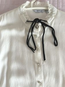 Chic White Blouse with Black Ribbon Detail🤍