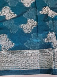 Elegant Teal Saree with Silver Border