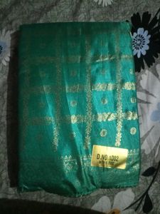 Green Silk Saree with Gold Border