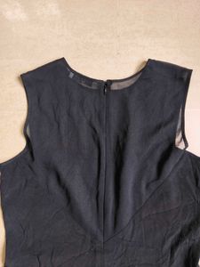 Sheer Black Peplum Top from paris
