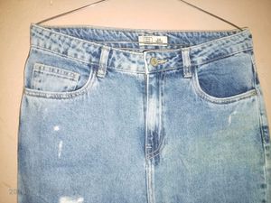 Distressed Blue Denim Jeans
