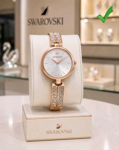 SWAROVSKI DREAM ROCK SILVER DIAL WD ROSEGOLD STRAP