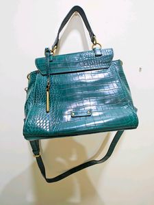 Green Sling Bag.