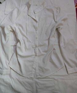 white pleated shirt