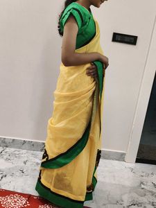 Elegant Yellow Saree with Green Border