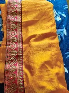 Vibrant Yellow Saree with Red Border