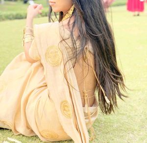 Elegant Beige Saree with Embellishments