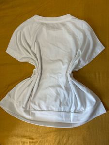 White Top with Crest Design