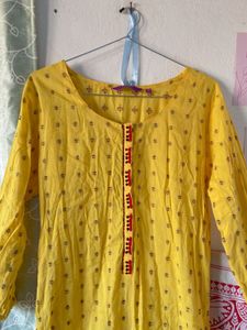 SALE:- Yellow Printed Kurti