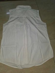 Classic White Sleeveless Button-Up Shirt