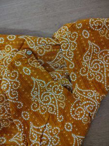 Mustard Yellow Printed Sleeveless Kurti
