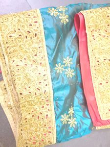 Elegant Teal Embroidered Saree