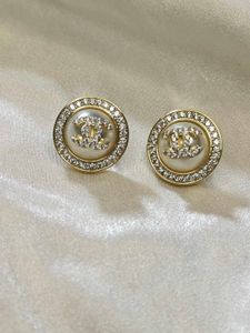 Elegant CC Pearl Stud Earrings