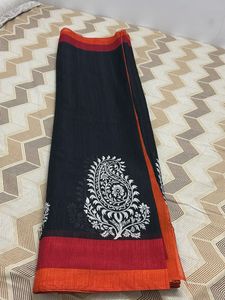 Elegant Black Saree with White Paisl
