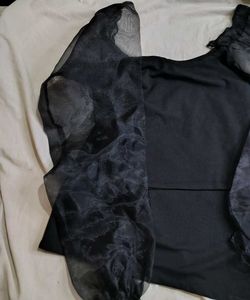 edgy ballon sleeve top with skirt