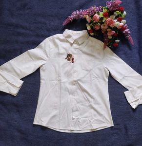 Chic White Button-Up Shirt with Embroidered Detail