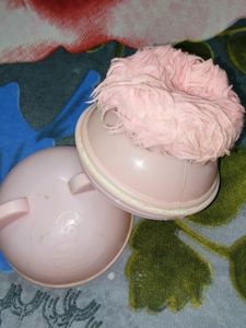 Pink Powder Puff For Babies And Decorated Diya