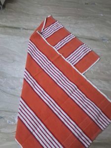 Orange and White Striped Folded Fabric