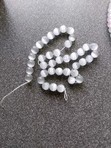 GLASS BEADS - Cat eye and Uv Light