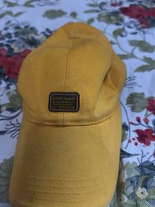 Amoldo Bassini Yellow Cap