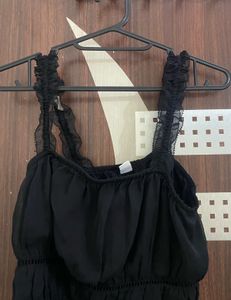 Black Ruffle Strap Top