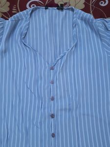 A S Size Ginger Top With Grey And White Stripes.