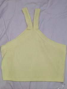 A yellow crop off-shoulder top