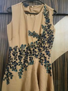 Elegant Beige Jumpsuit with Embellishments