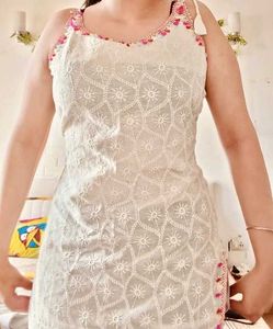 Sleeveless white kurti trending