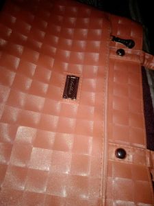 Chic Peach Textured Handbag