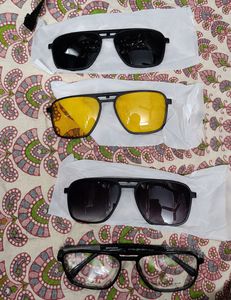 four pairs of eyewear laid