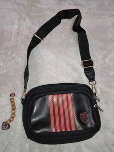 black sling bag with red strip🌸🌸