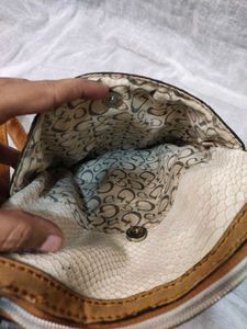 Authentic Guess snake patterned sling Bag