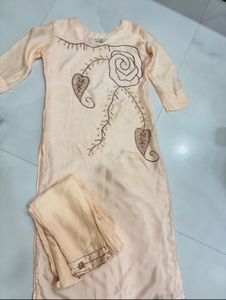 Elegant Peach Kurta Set with Intricate Embroidery