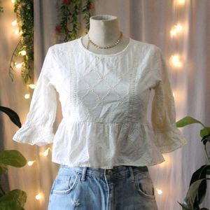 White Embroidered Peplum Top