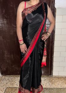 Elegant Black butter crepe Saree with Red Border