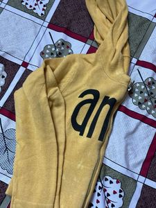 Yellow Zip-Up Hoodie with Graphic Print