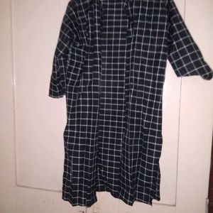 Chic Checkered Shrug with Gray Dress