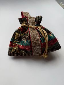 Luxury Brocade Potli Bag with Stone Jhumka Latkans