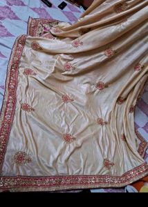 Beautiful pink and cream saree with Mqtching Neckl