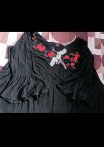 Chic Black Top with Crane Embroidery