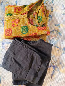 Yellow Printed Kurta with Black Pants