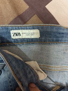 Light Wash Distressed Denim Jeans
