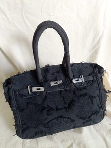 Stylish Black Textured Handbag